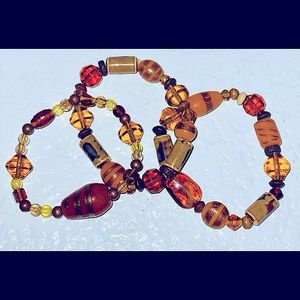 Set of 3 Women’s Orange, Gold and Brown Glass and Stone Beaded Bracelets.